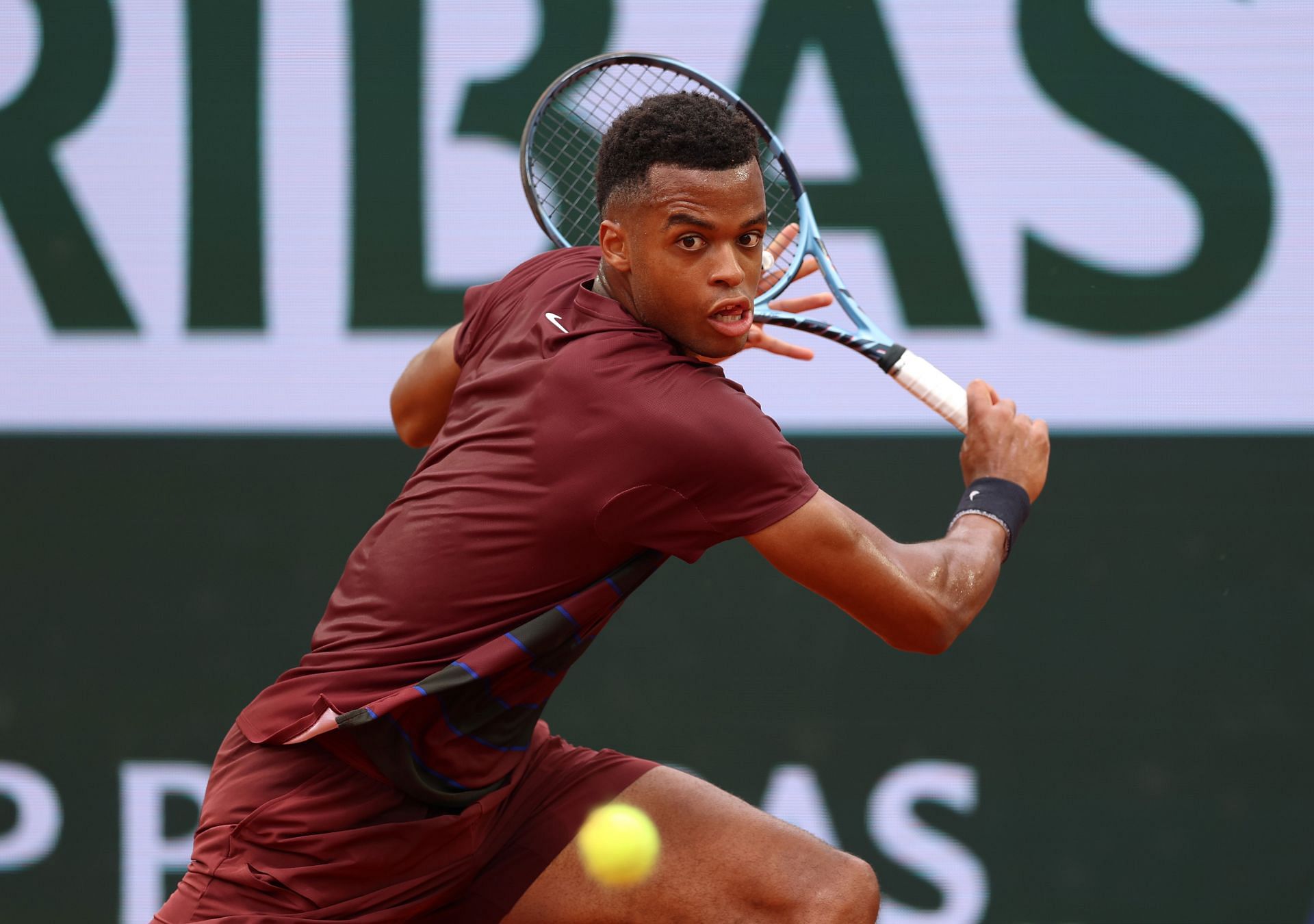 Giovanni Mpetshi Perricard tracks down a ball at French Open | Image Source: Getty
